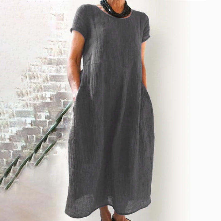 Stylish women's summer T-shirt dress, solid color, providing ultimate comfort and loose fit.