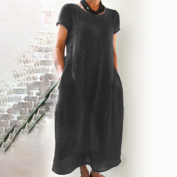 Women's casual solid color cotton dress, loose fit, a versatile piece for any wardrobe.