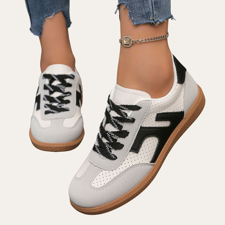 Women's casual low top canvas sneakers with white laces, perfect for spring fashion and everyday wear