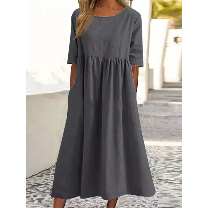 Versatile women's long maxi dress with half-sleeves & pockets, perfect for casual spring fashion.