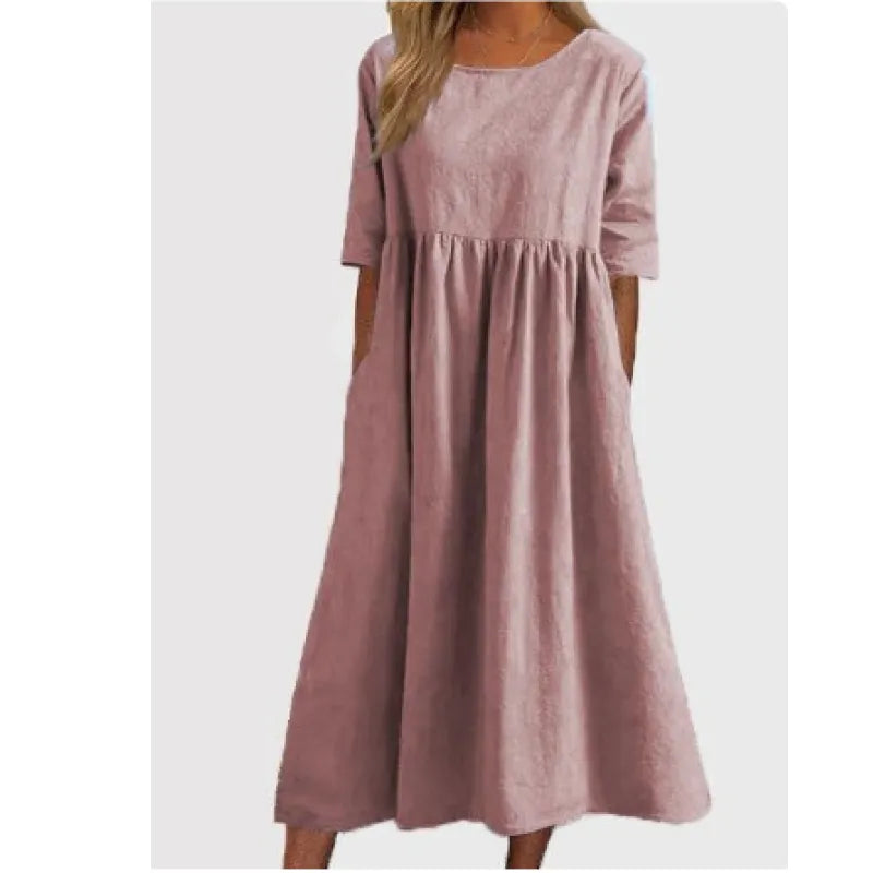 Long casual women's dress with half-sleeves & pockets, perfect for versatile spring and summer fashion.