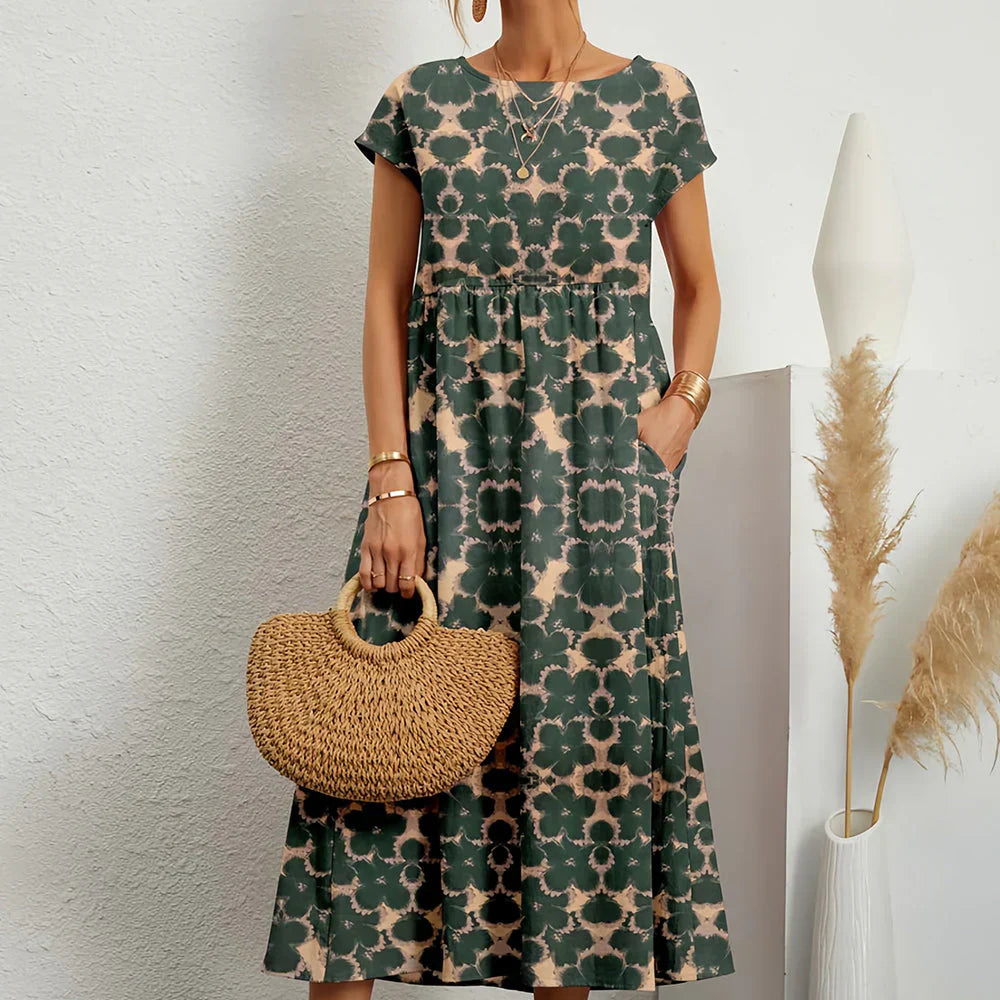 Stylish women's relaxed fit midi dress for everyday wear. Casual cap sleeve spring/summer dress.