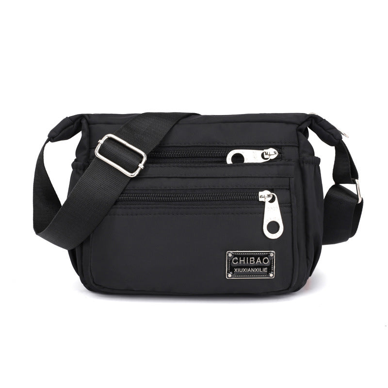 Multiple women's casual nylon crossbody shoulder bags in various colors, a versatile collection