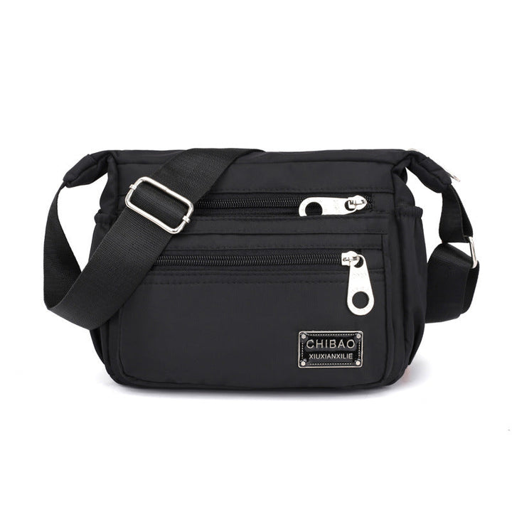 Multiple women's casual nylon crossbody shoulder bags in various colors, a versatile collection