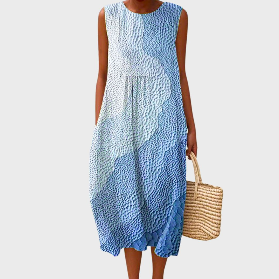 Comfortable women's sleeveless plaid midi dress featuring a round neck & tiered skirt, great for summer.
