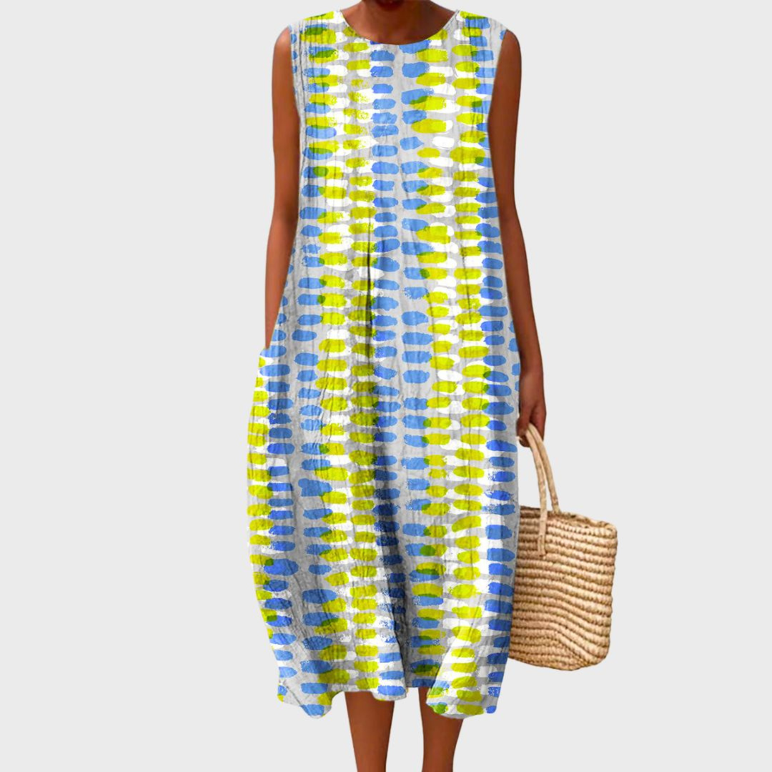 Casual women's sleeveless midi dress in a chic plaid print, perfect for warm weather & everyday comfort.