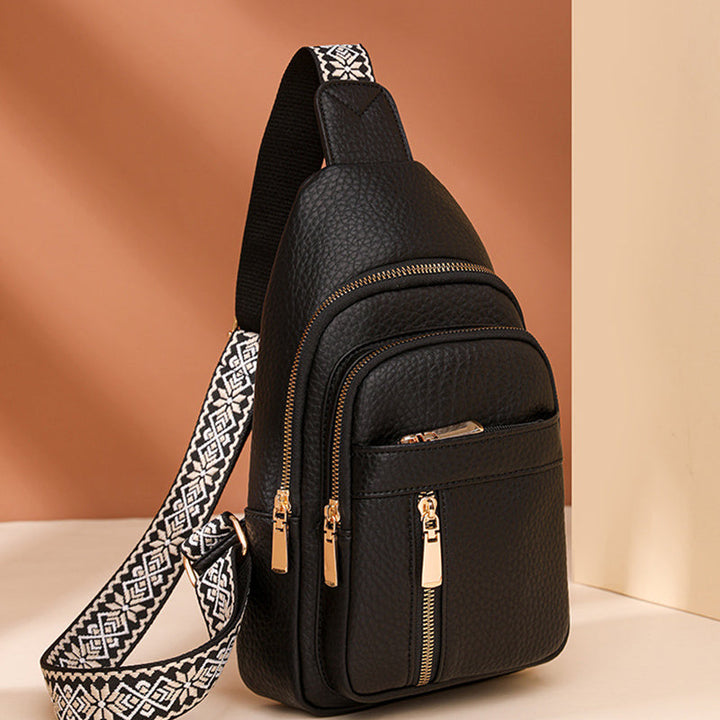 Elegant black PU leather fanny pack for women, casual yet chic crossbody style