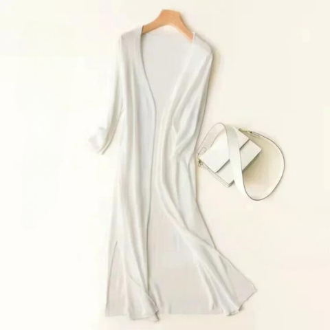 Elegant women's casual longline cardigan, relaxed fit in a breathable, lightweight knit fabric.