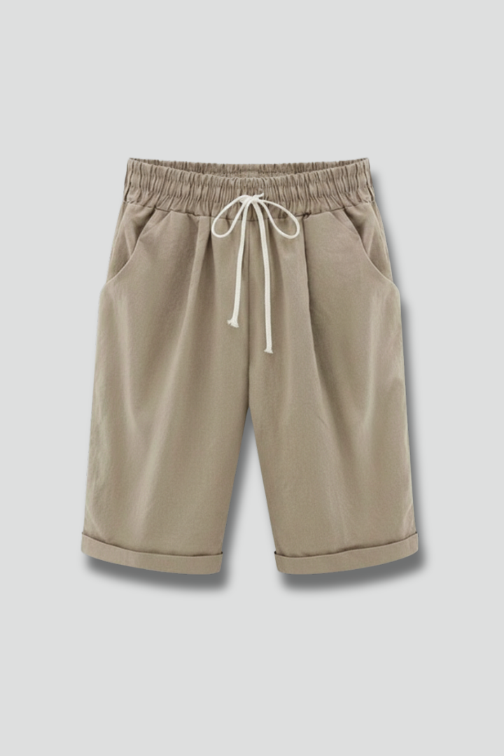 Women's casual shorts with elastic waist, drawstring, & cuffed hem. Perfect for summer everyday style & comfort.