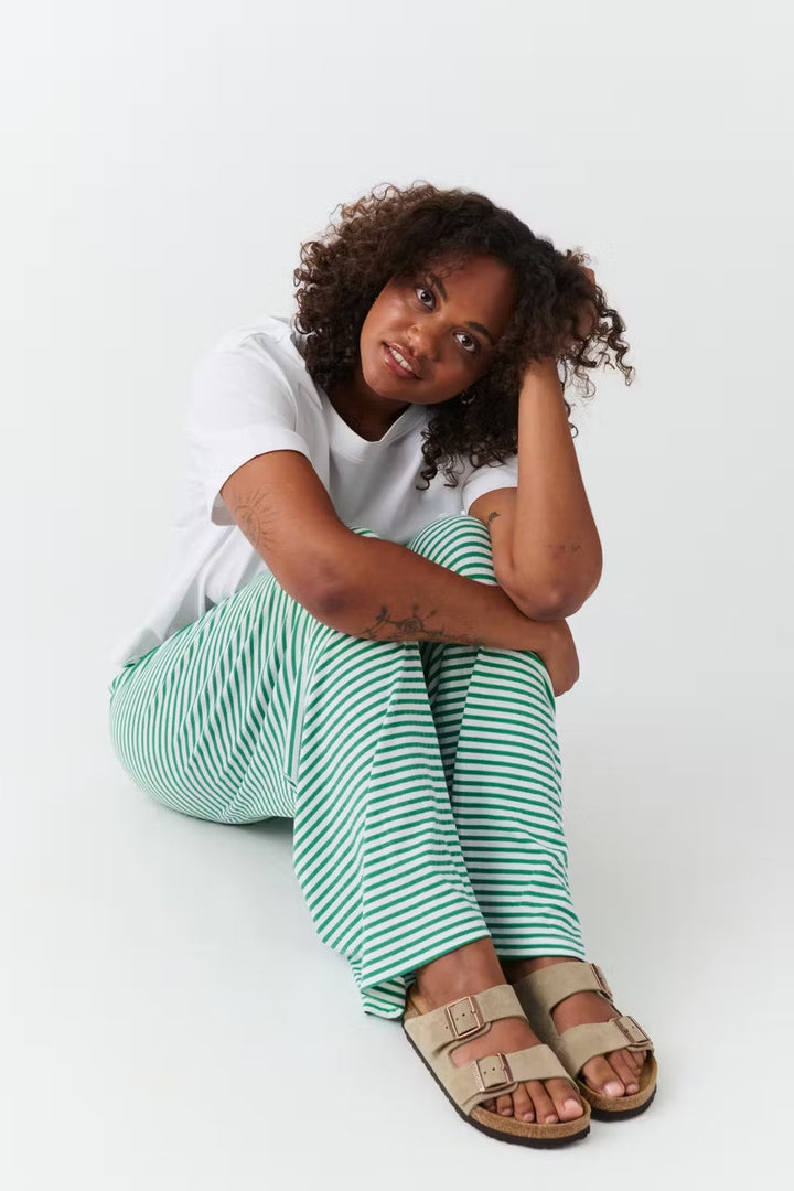 Striped relaxed fit women's pants, versatile and comfortable for various casual occasions.
