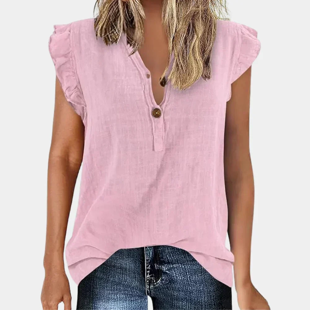 Versatile ladies summer blouse. Lightweight, loose-fit long sleeve top with a casual button-down V-neck.