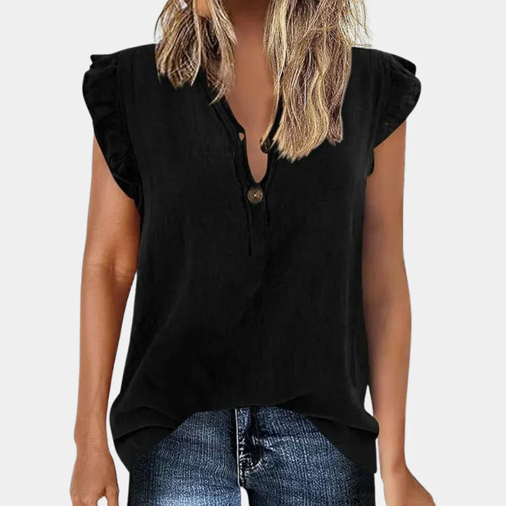 Chic women's long sleeve summer blouse. Loose-fit V-neck button down top, great for casual everyday fashion.
