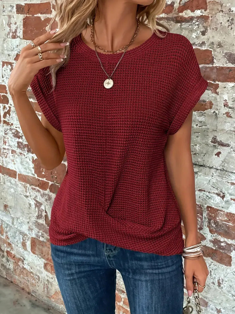Everyday women's casual tee with a fashionable twist front detail. Comfortable and stylish blouse.