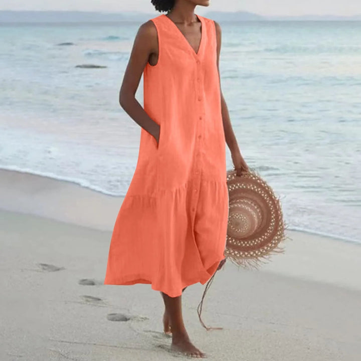 Casual women's summer V-neck midi dress with button front and tiered design, sleeveless.