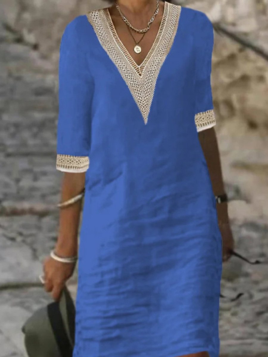 Stylish women's knee-length V-neck summer dress, featuring lace trim and a comfortable relaxed fit. Perfect for spring.