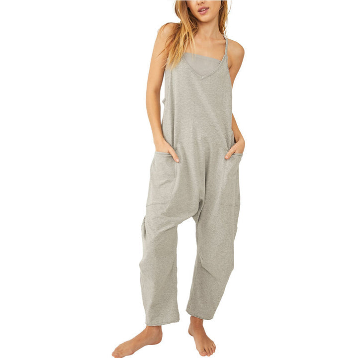 Folded women's pocket jumpsuit, displaying its soft fabric and a V-neck design, ready for comfortable wear.