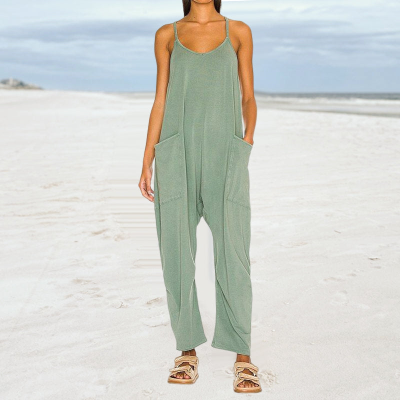 Stylish women's V-neck jumpsuit in a solid color, ideal for casual wear with its wide-leg and convenient pockets.