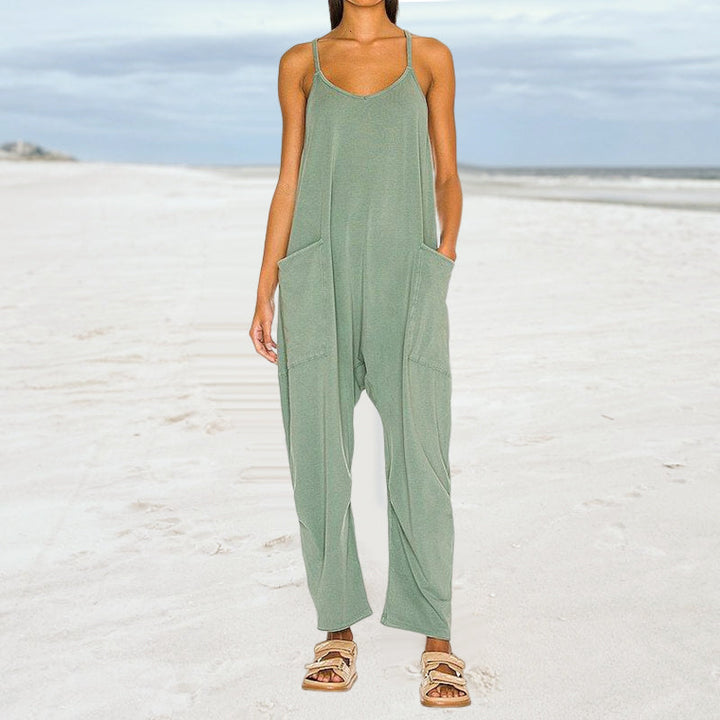 Stylish women's V-neck jumpsuit in a solid color, ideal for casual wear with its wide-leg and convenient pockets.