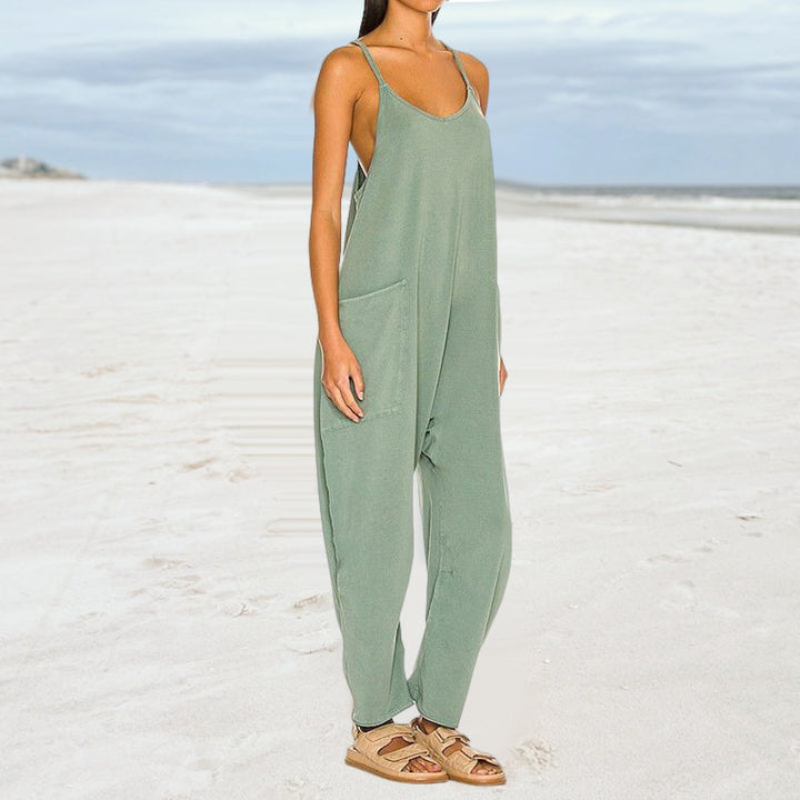 Model wearing a women's loose fit jumpsuit, demonstrating its versatility and comfortable, flowy design.