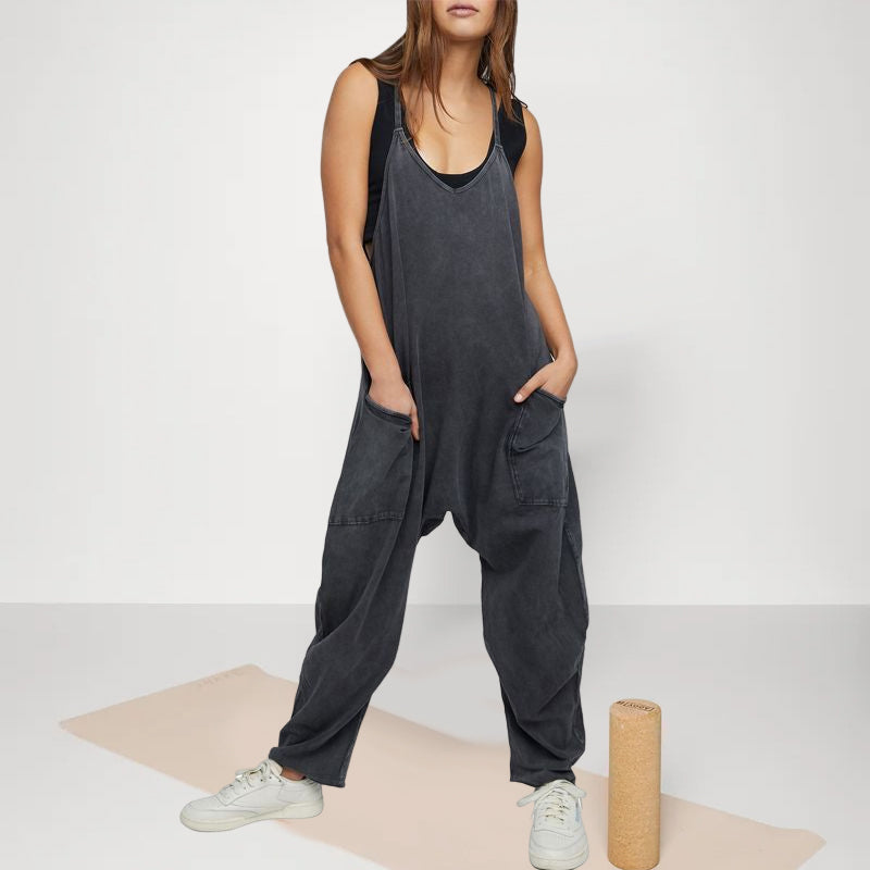Bottom half of a women's wide-leg jumpsuit, emphasizing the comfortable fit and deep, functional pockets.