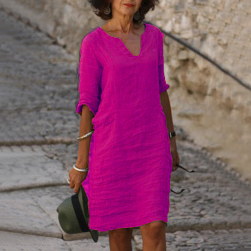 Stylish women's V-neck midi dress, 3/4 sleeve, great for summer vacations, casual outfits & everyday style.