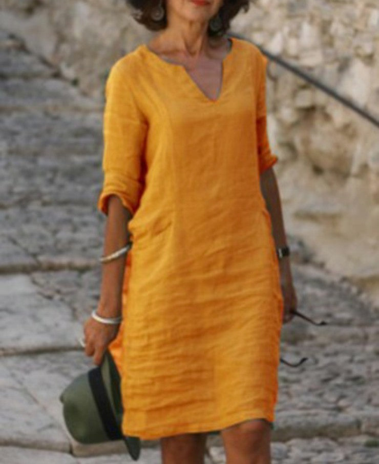 Casual women's V-neck midi dress, 3/4 sleeve, comfortable and stylish for summer fashion.