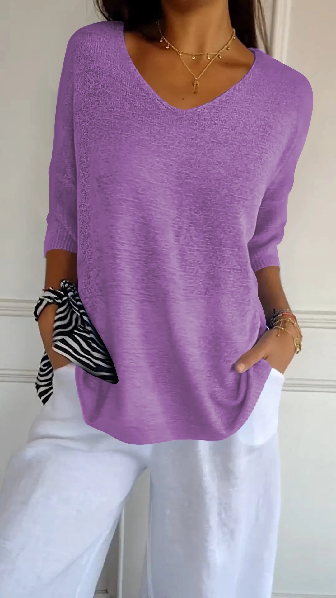 Women's casual V-neck pullover for effortless style; comfortable loose fit for versatile daily outfits.
