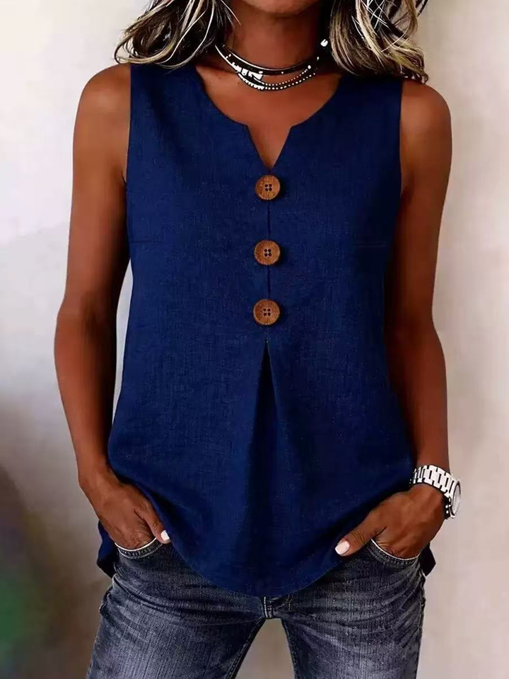 Chic women's sleeveless V-neck top featuring a pleated front & loose, comfy fit. Ideal for warm weather.