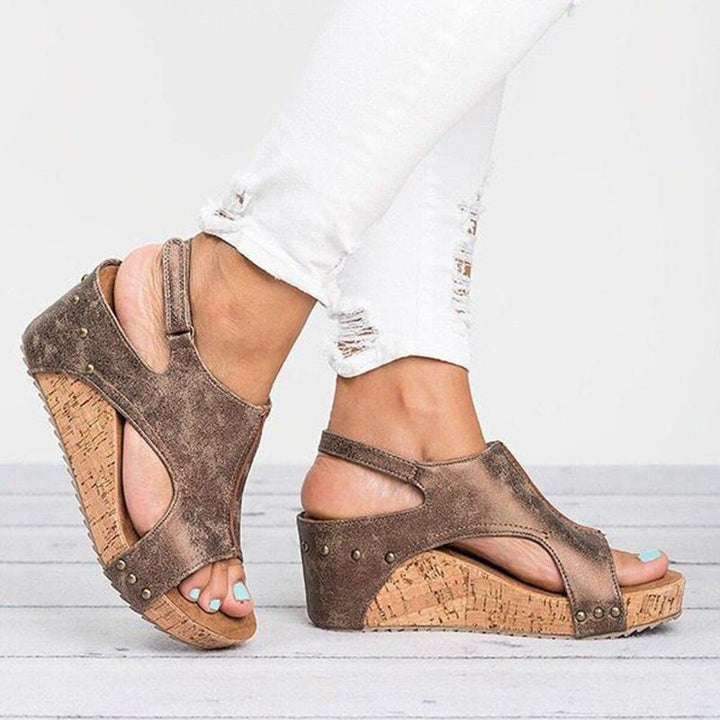 Elegant women's casual wedge sandals made with durable PU leather material