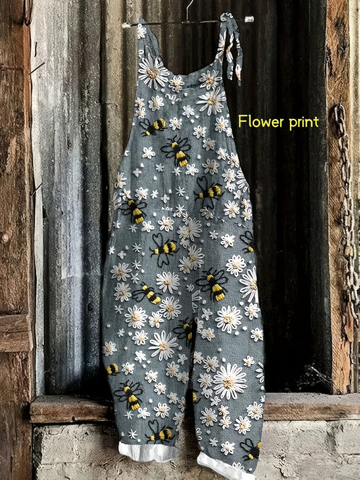 Comfortable women's casual jumpsuit, daisy bee print, wide-leg, tie-shoulder, and practical pockets.