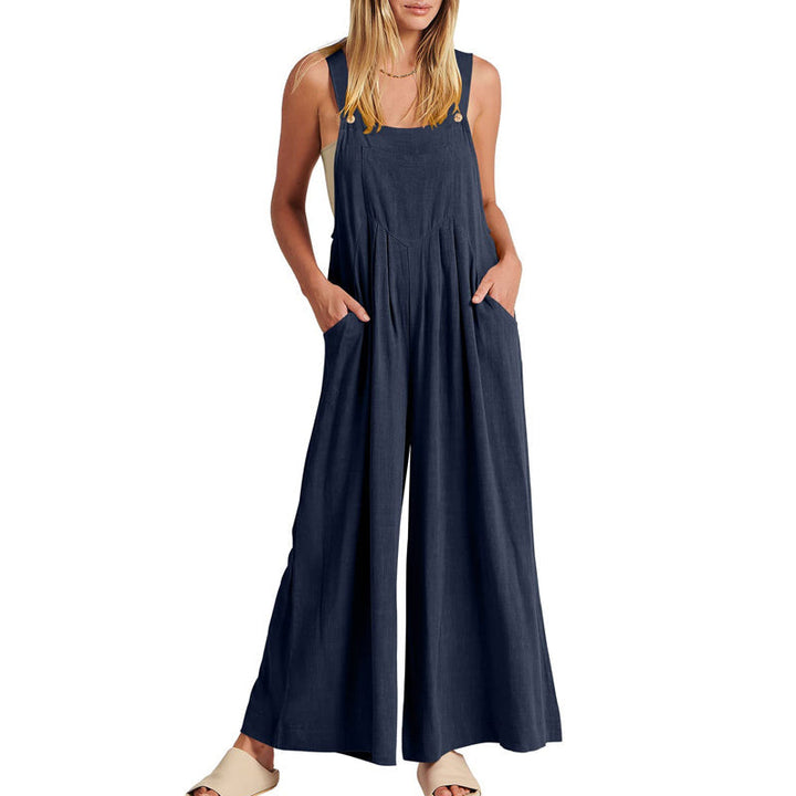 Close-up of the fabric detail on a black polyester wide leg sleeveless jumpsuit for women.