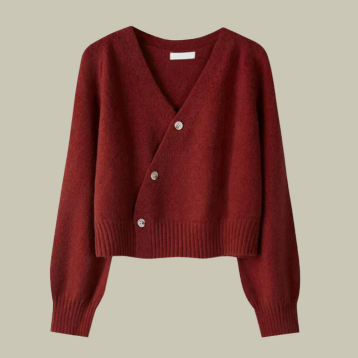 Front view of a women's long-sleeve merino wool sweater with a fashionable cross button v-neck.