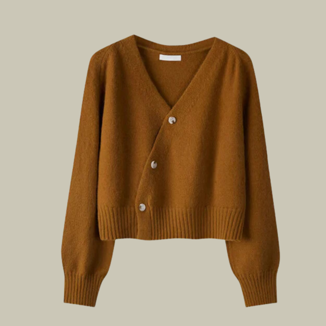 Warm and cozy women's merino wool sweater, v-neck with decorative cross button closure.