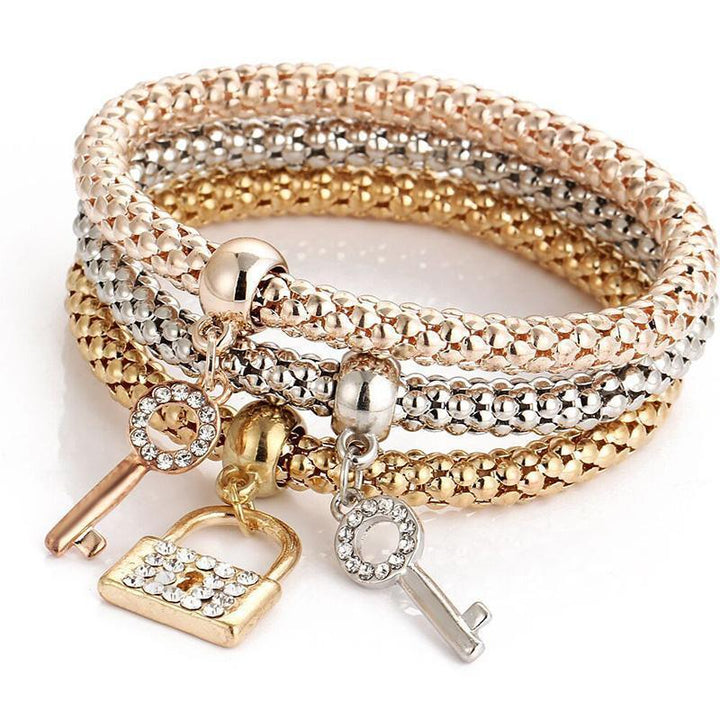 Stylish women's jewelry gift set: multiple charm bracelets with dazzling rhinestones on popcorn chains
