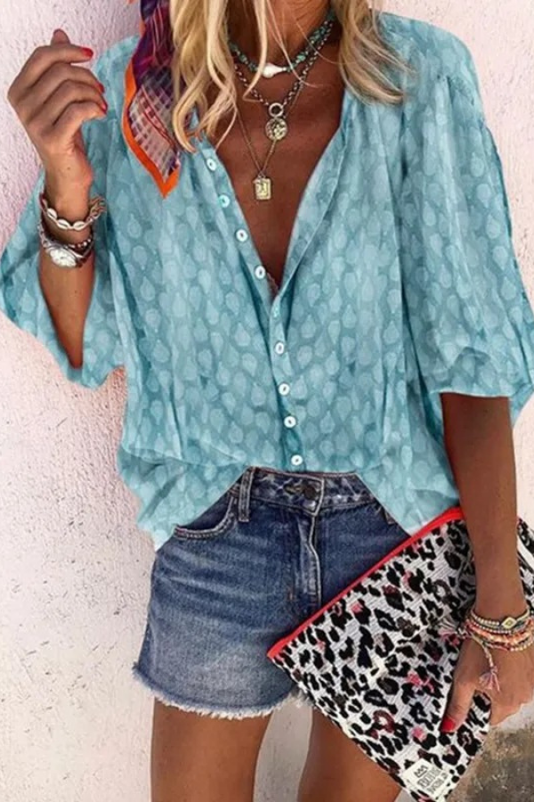 Women's chic airy button-down blouse in a relaxed fit, perfect for versatile spring and summer fashion.