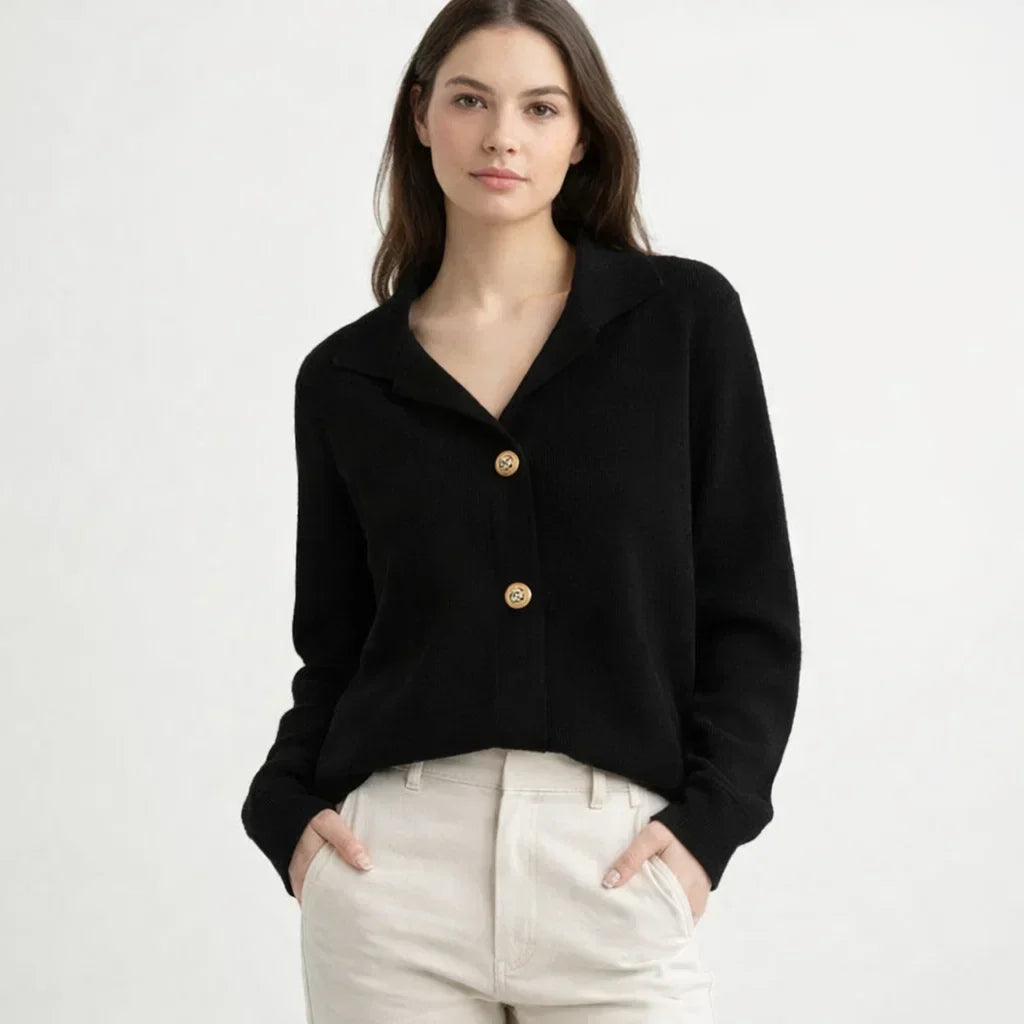 Versatile women's button-up knit cardigan. Effortless asymmetrical design for fall layering.