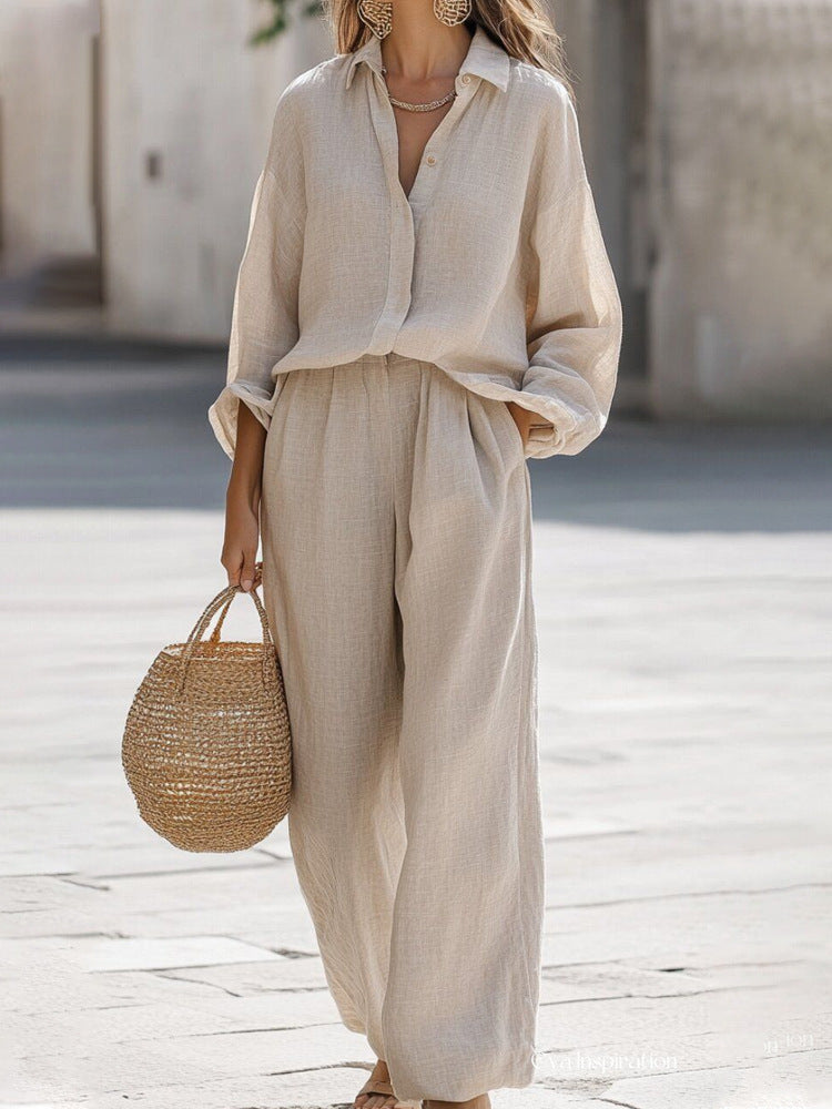 Versatile women's chic two-piece blouse and pant set for casual or elegant occasions.