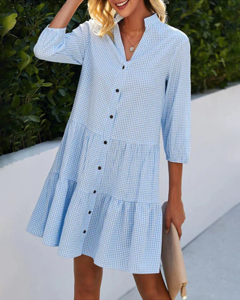 Women's chic blue checkered midi summer dress with short sleeves and button front. Perfect casual relaxed fit.