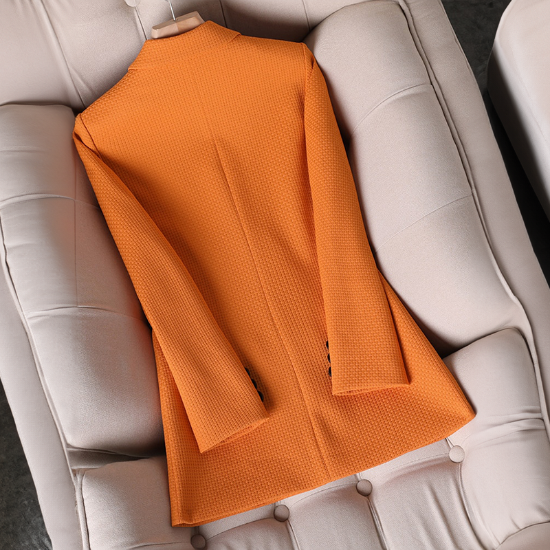 Chic women's checked blazer in a professional style. Perfect elegant outerwear for autumn & office.