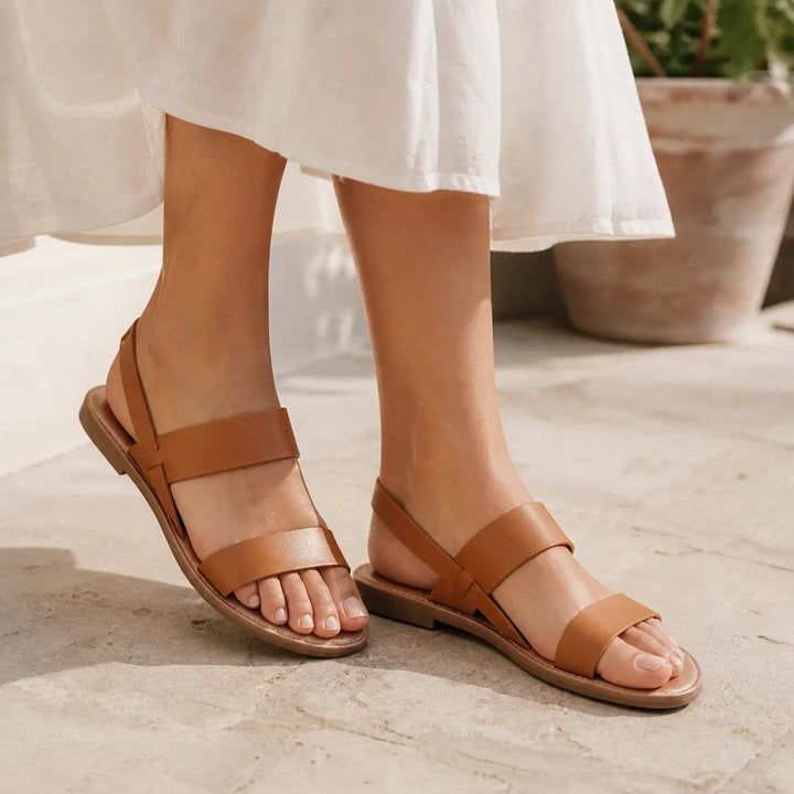 Comfortable open-toe flat sandals for women, easy wear summer style.