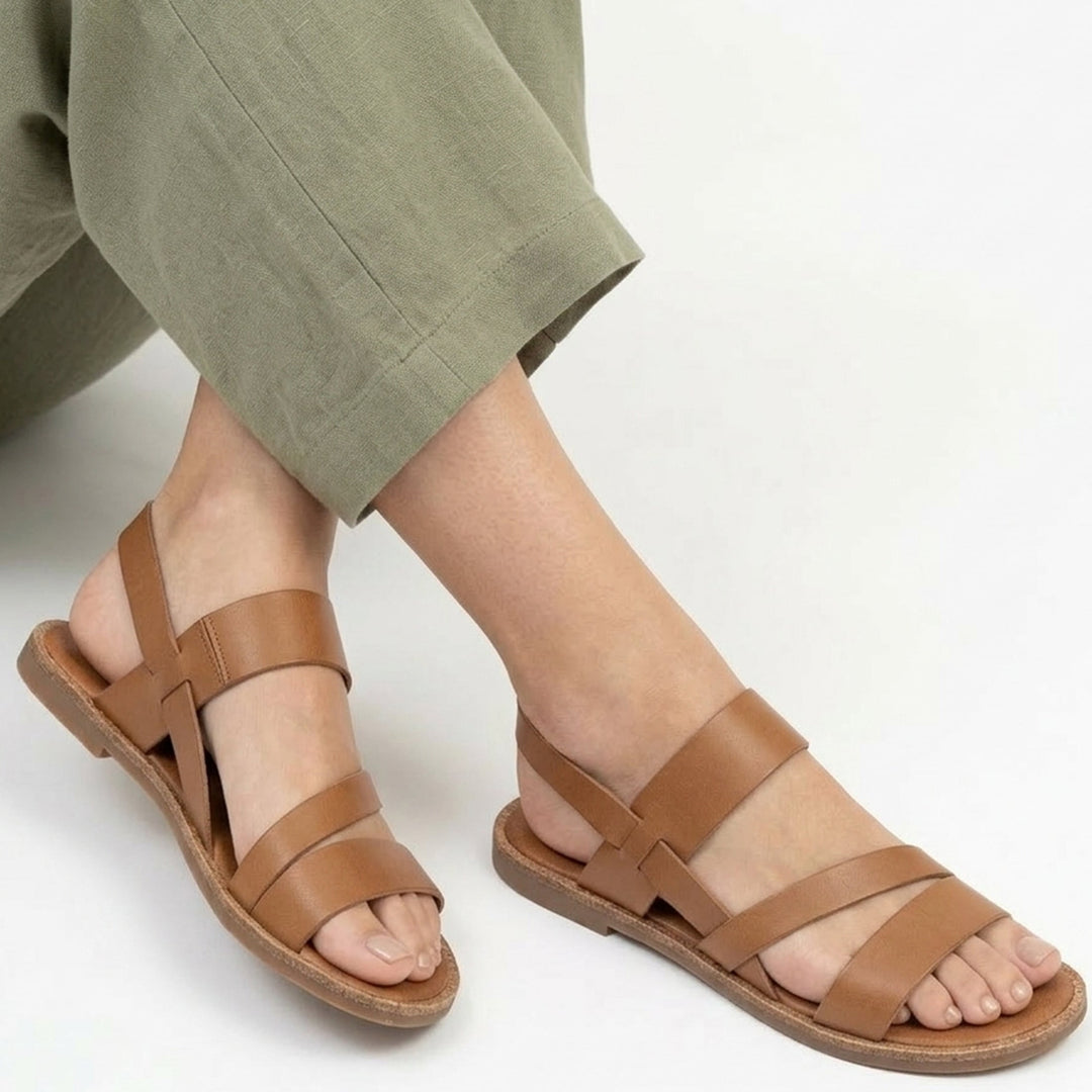 Women's flat open-toe sandals, ideal casual footwear for summer and vacation.