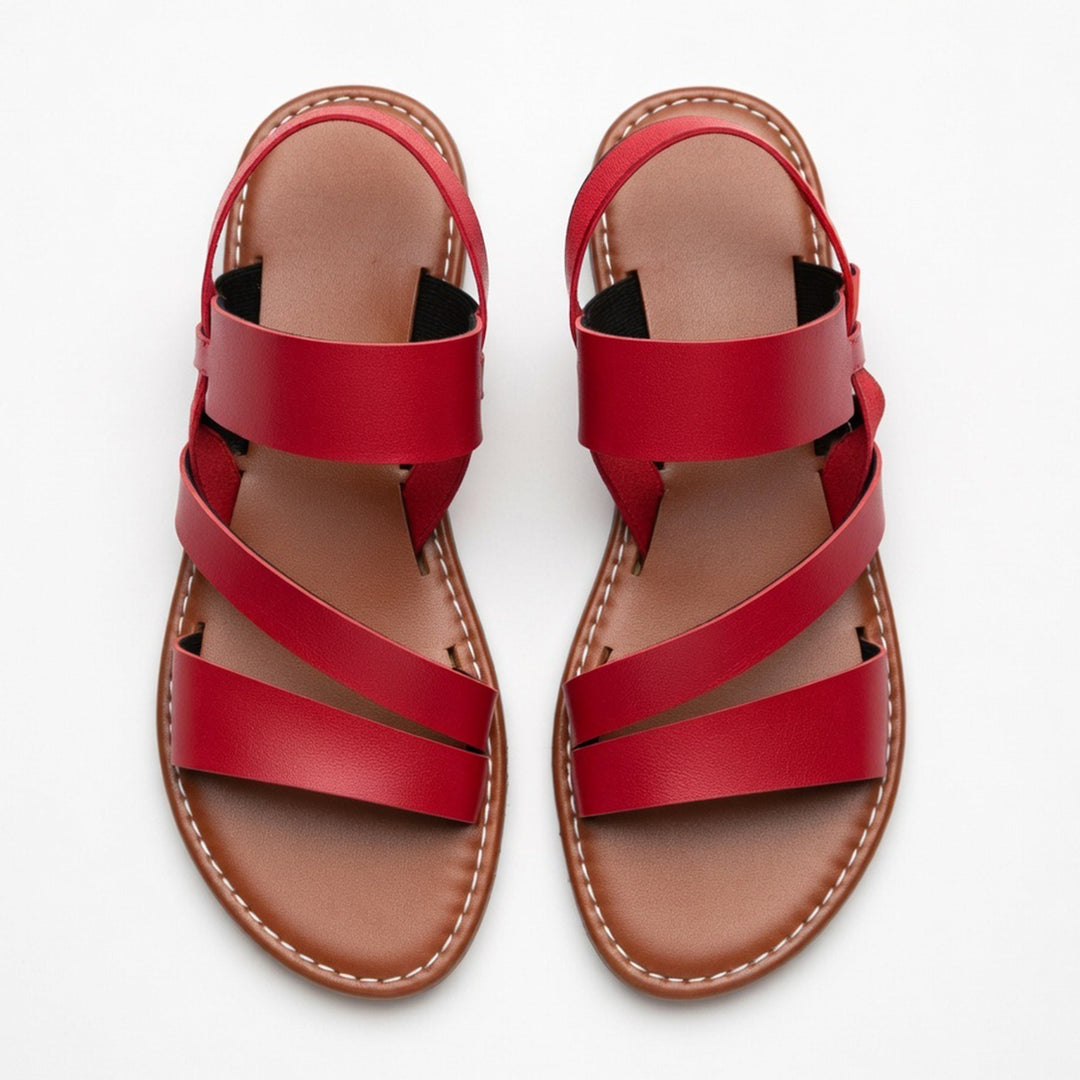 Chic women's crossover strap flat sandals, perfect for warm weather and easy wear.