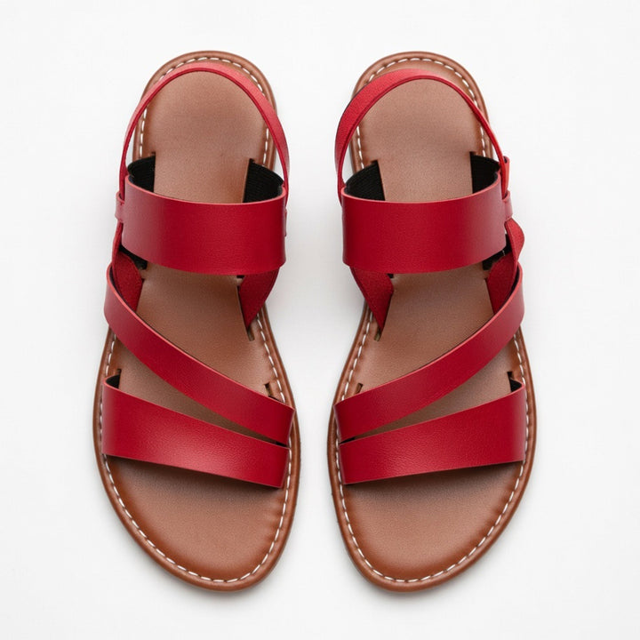 Chic women's crossover strap flat sandals, perfect for warm weather and easy wear.