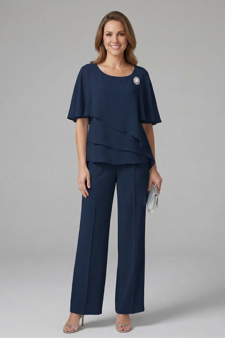 Summer fashion: Women's blue two-piece set featuring a layered top and pull-on straight leg trousers for comfort.