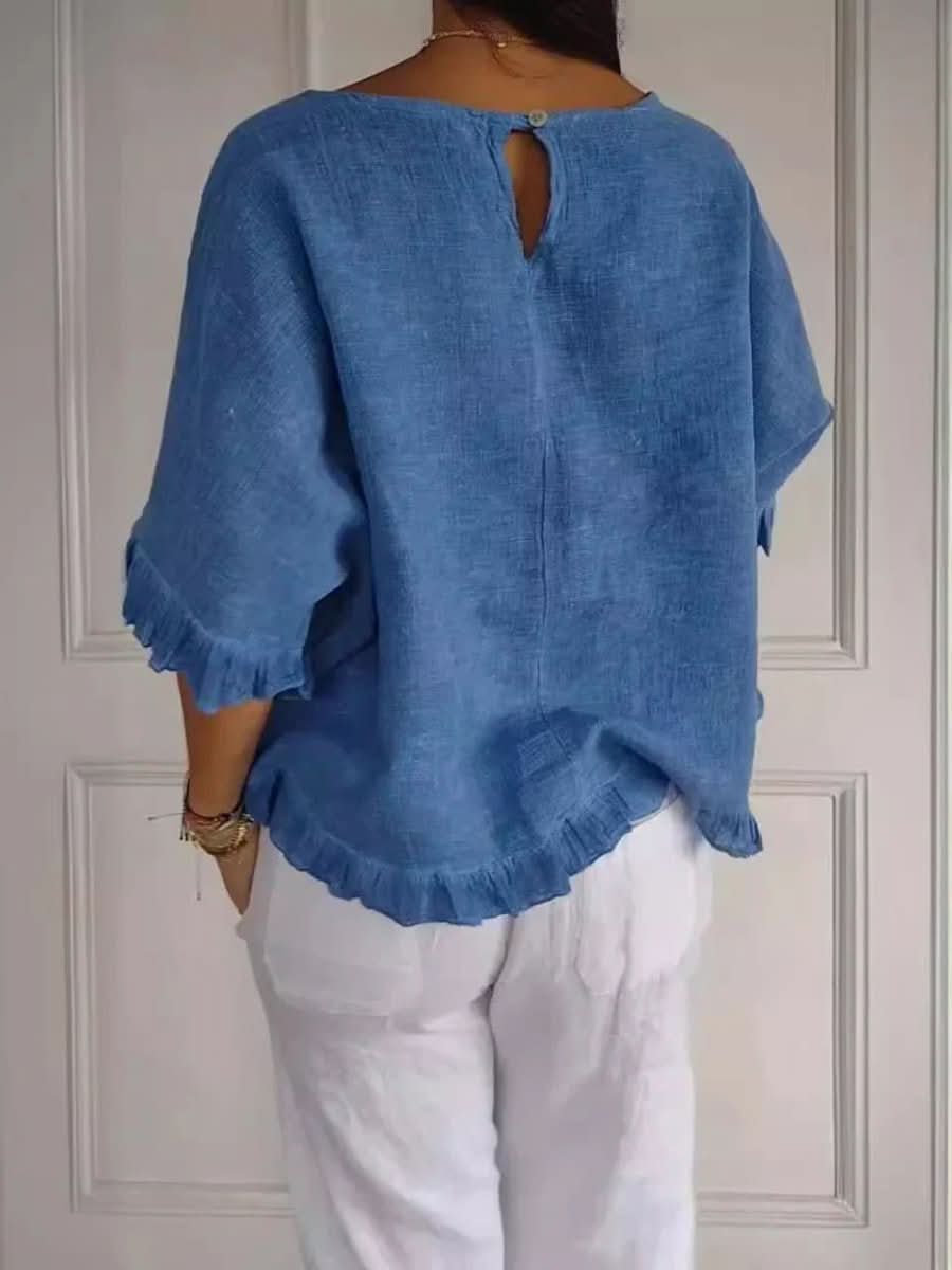 Versatile chic ruffle blouse. Stylish women's top for effortless work wear or casual outings.