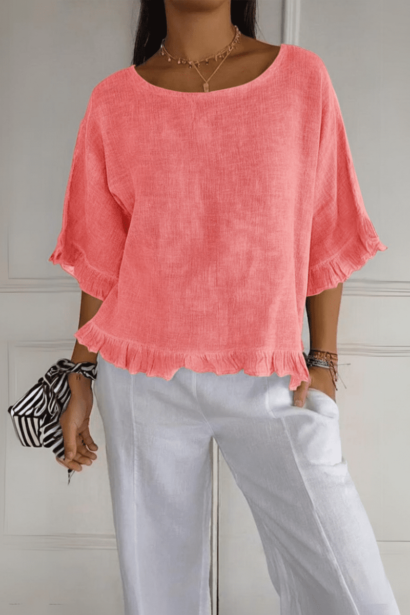 Effortless chic women's ruffle blouse. A fashionable and comfortable top for everyday style.