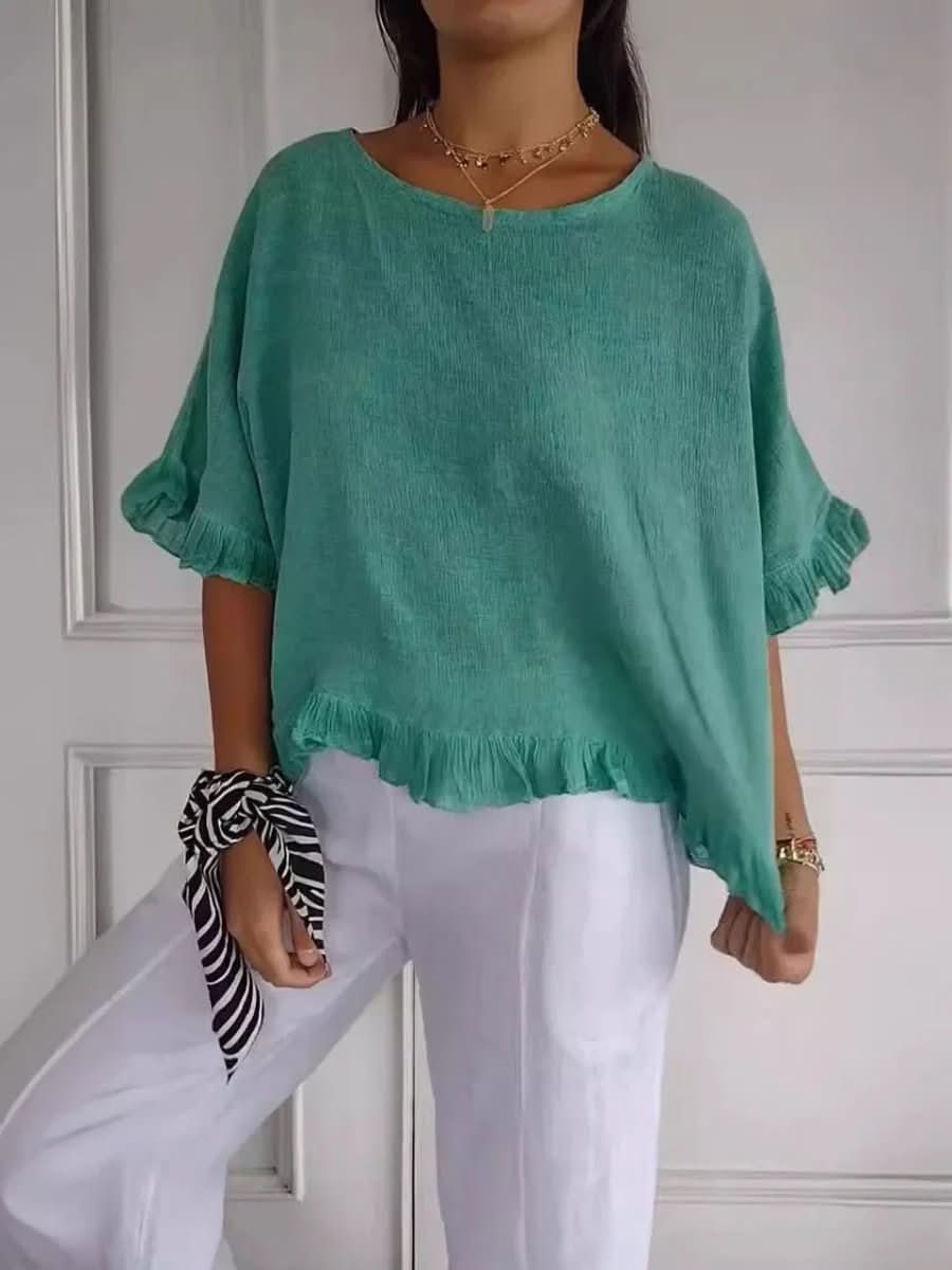 Sophisticated women's elegant ruffle blouse. A versatile chic top for professional or leisure wear.