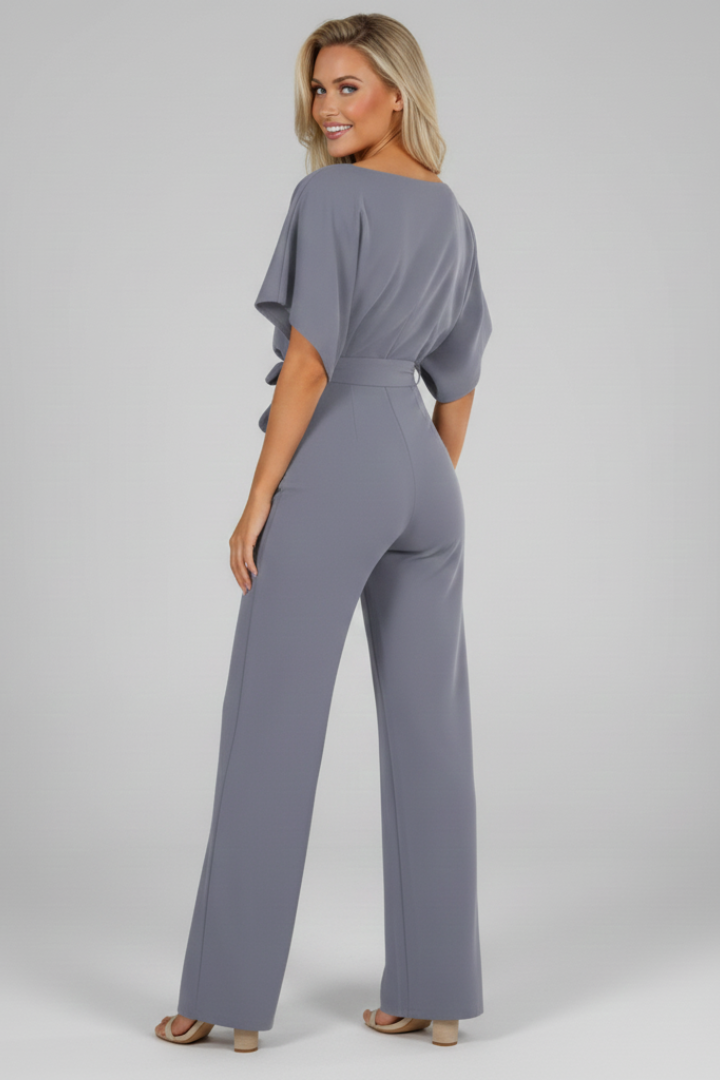 Stylish women's one-piece jumpsuit, short sleeve, waist tie. Versatile for elegant or casual spring/summer looks.