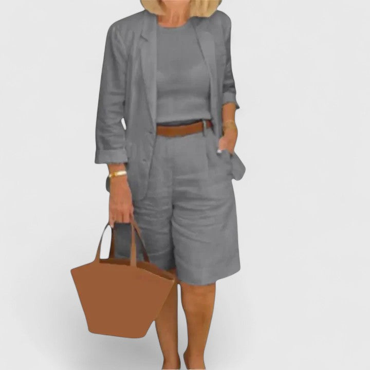 Elegant women's summer suit set with a stylish blazer and tailored Bermuda shorts for versatile wear.