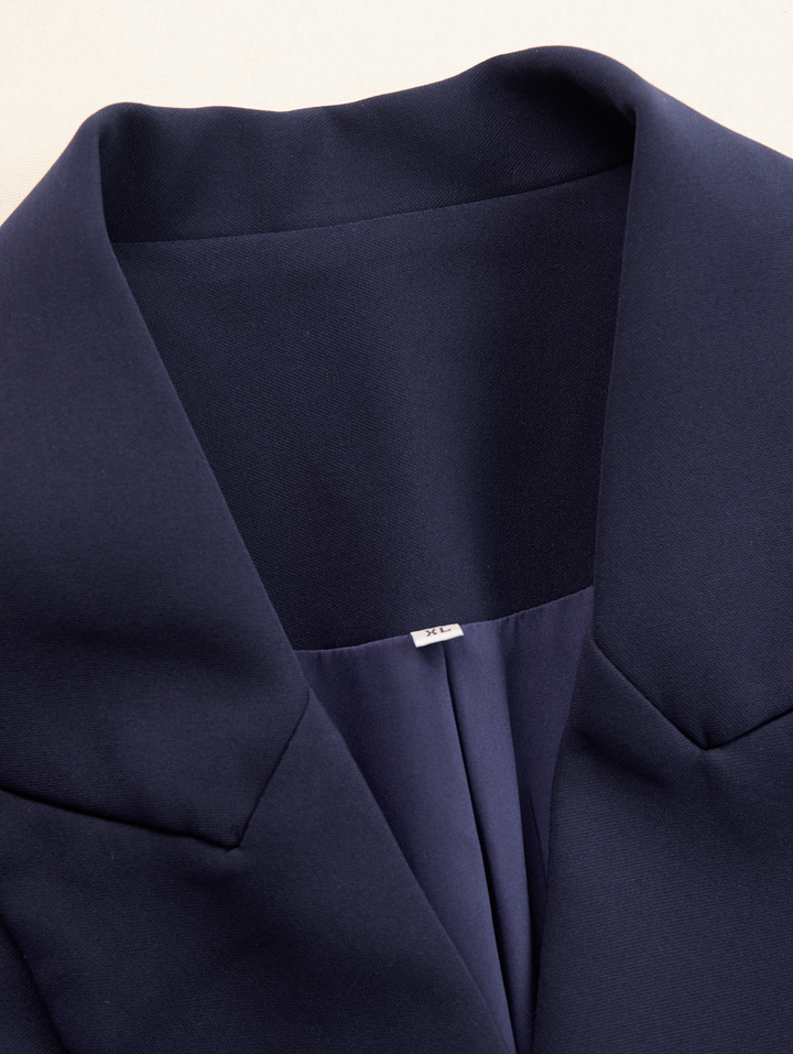 Stylish women's elegant midi dress, featuring a tailored blazer design for a sophisticated formal look.